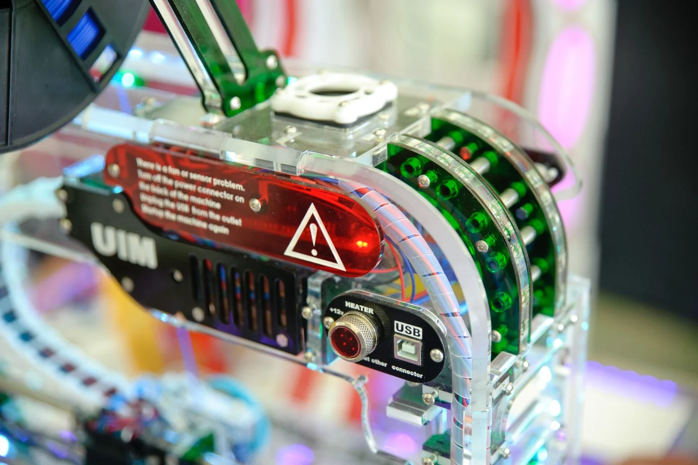 Identification and warning labels on an industrial machine component